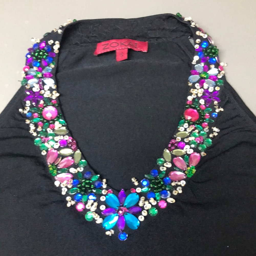 Zokai sequinned cut away statement piece.